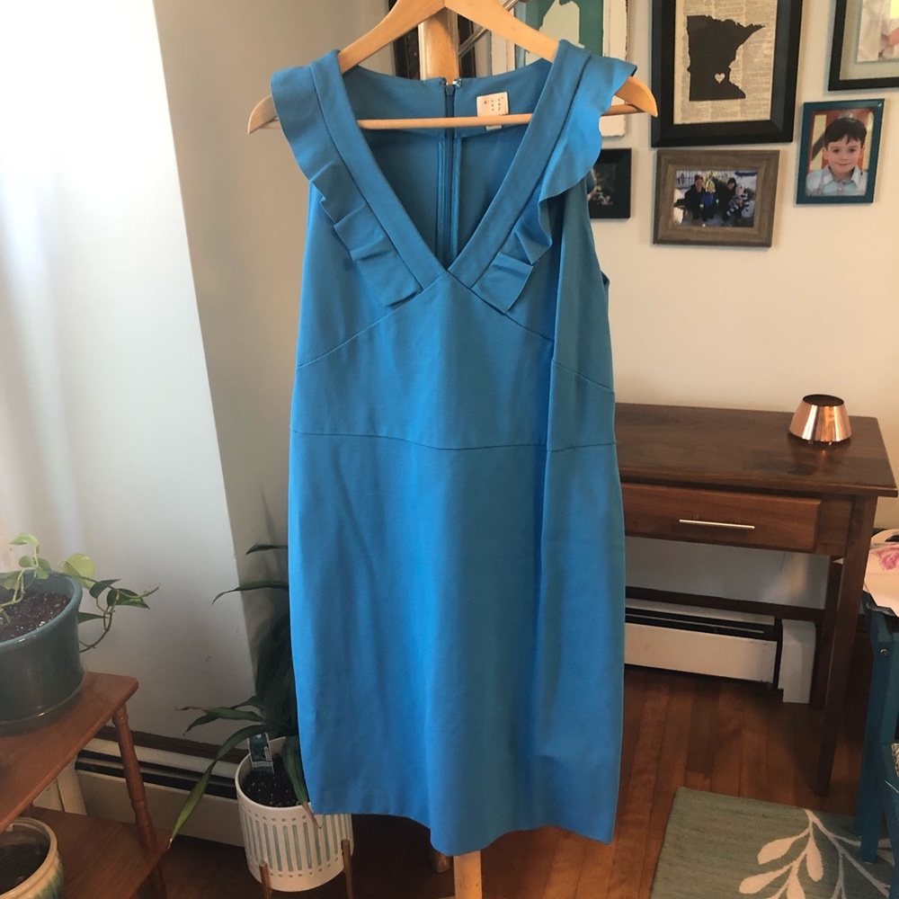 NWOT blue sheath dress with ruffle detail.